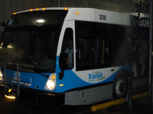 A clean bus emerges from the Guelph Transit bus-wash facility