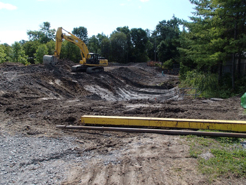 Construction to retrofit the Lincoln stormwater management pond