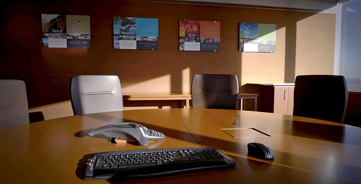 Photo of wireless computer keyboard and mouse and Polycom system on the table