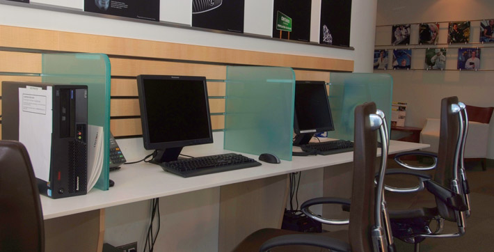 Photo of 3 guest computer stations in the Library