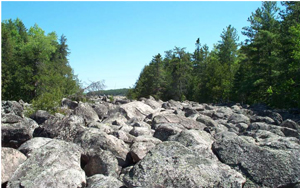 Picture showing glacial melt water channel along the course of the present-day Turtle River, between Elsie and Mable Lakes.