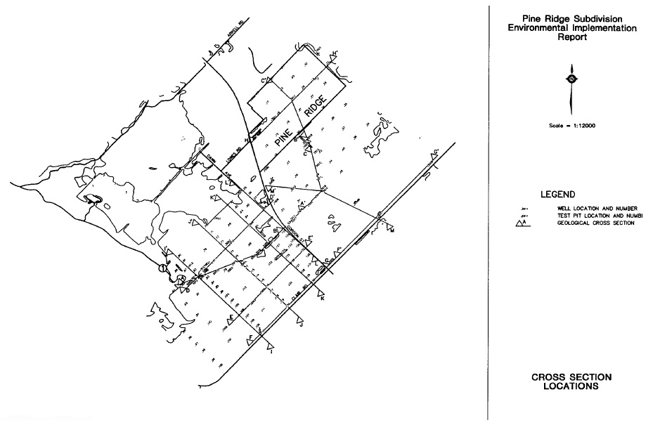 A map shows the location of monitoring wells on a subdivision. 
