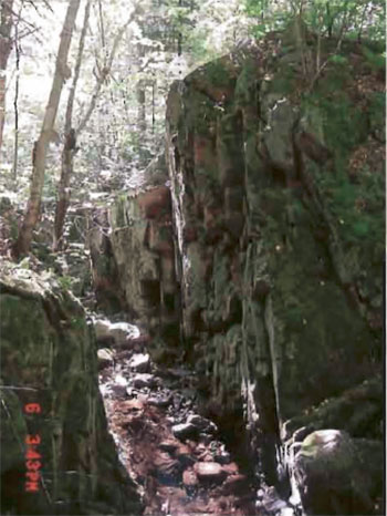 Photo shows Rock chasm located south of Kinahan Lake