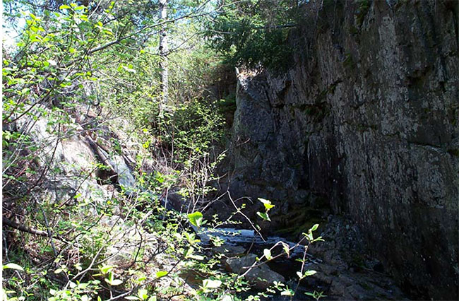 Rock cleft near southeast boundary, Farrington Township Conservation Reserve (scarp on the right is approx. 7 metres in height)