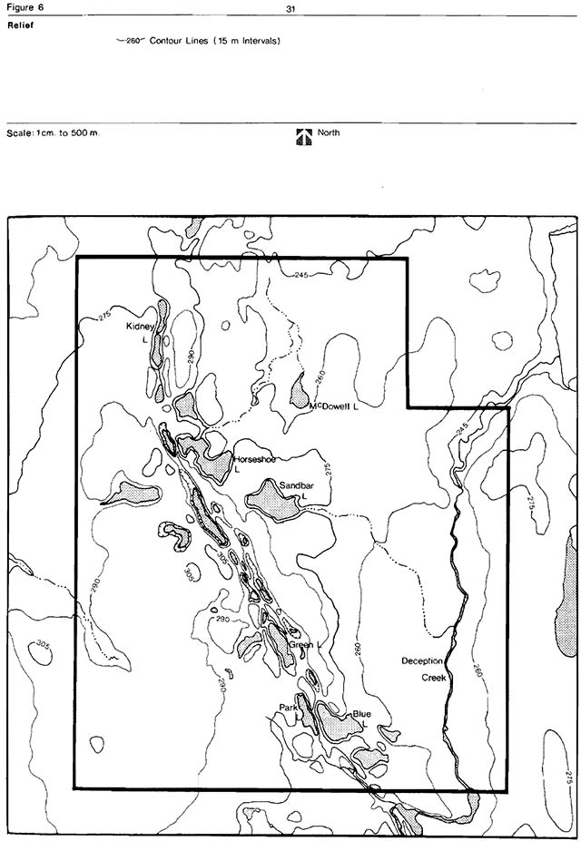 Black and white line map of contour lines indicating landscape elevation features.