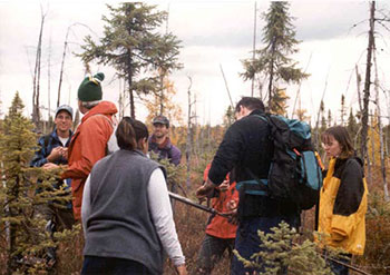 This photo shows individuals gathering for educational opportunity at Loudin Basin Peatland .