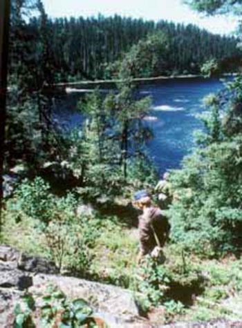 Photo of a man Hiking – Whitefish Falls on the Little Missinaibi River.