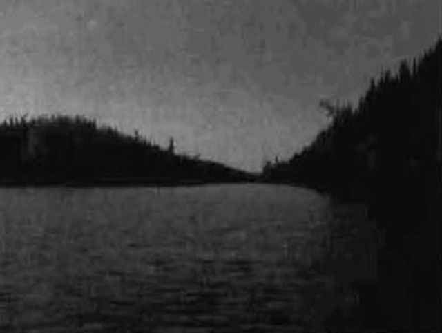 black and white photo of Mistinikon Lake