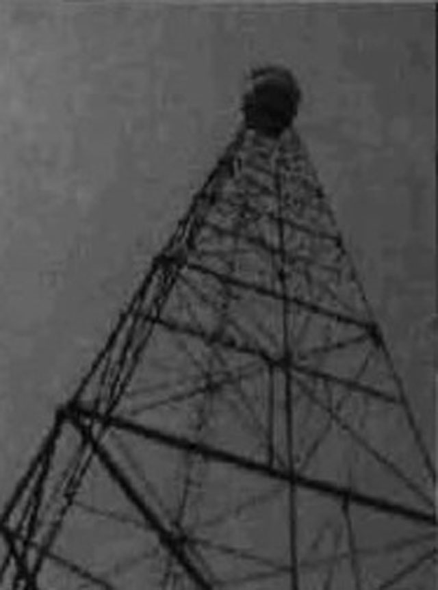 Black and white photo of a fire tower.