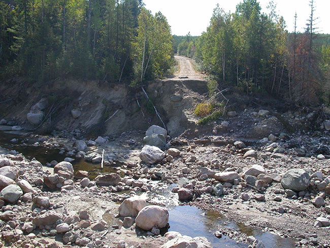 This photo shows Cee Creek washout of the Mozhabong access road.