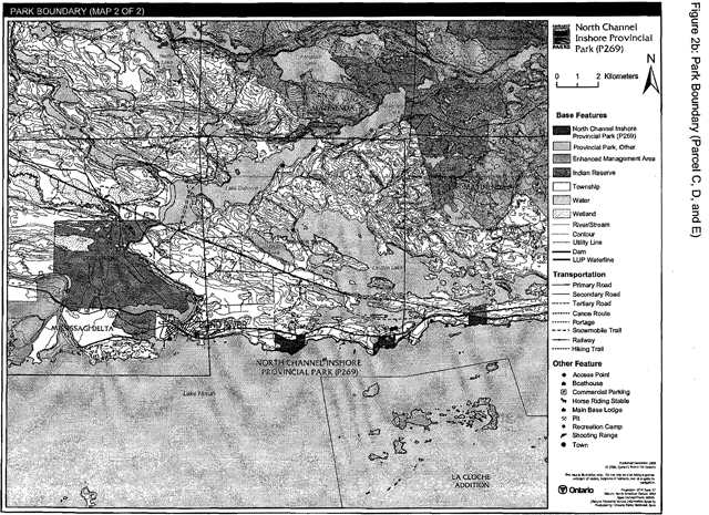 Greyscale map  depicts base features, transportation infrastructure and other features in shades of grey and dotted lines. 