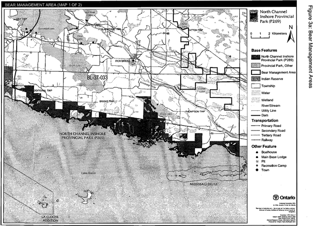 Greyscale map depicts the Park Bear Management Areas with black lines, and base features, transportation infastructure and boathouse, Base lodge, recreation camp, town and pits with dashed lines and shades of grey.