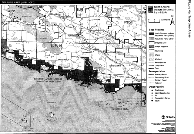 Greyscale map depicts the Trap Line Areas with black lines, and base features, transportation infastructure and boathouse, Base lodge, recreation camp, town and pits with dashed lines and shades of grey.