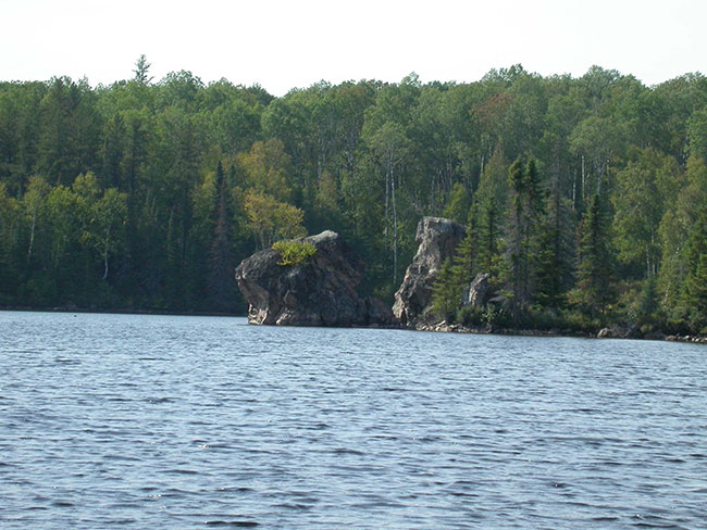 This photo shows Shoreline with large rocks in Muldrew Bay.