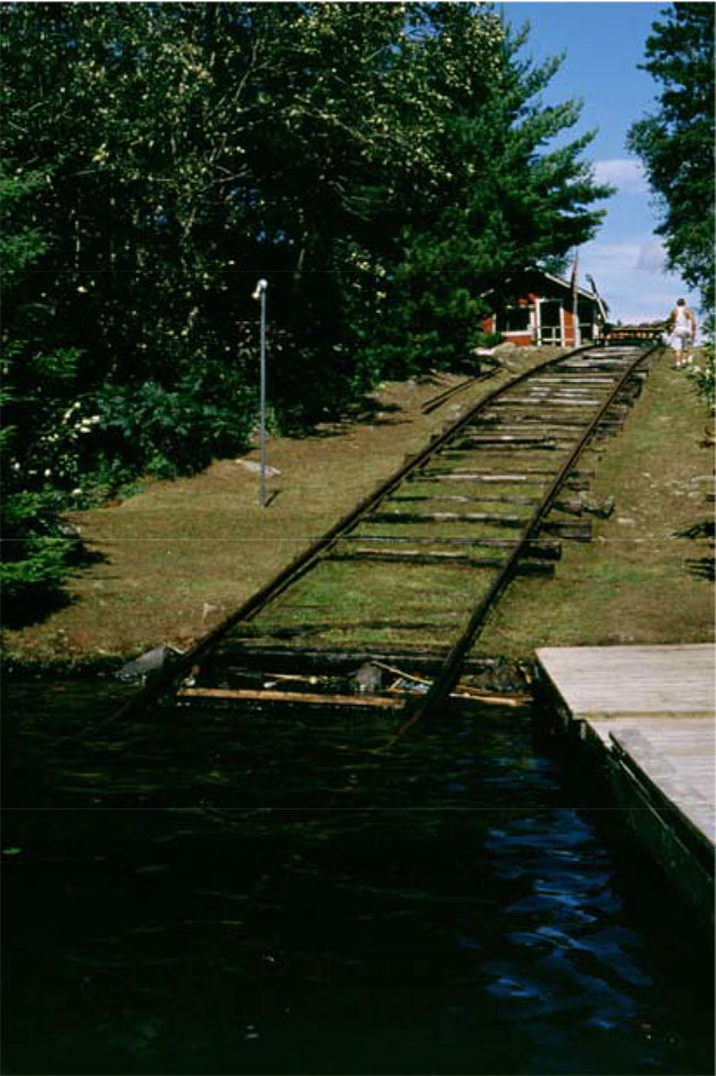 This photo shows Mechanized portage between Burditt and Feather Lakes.