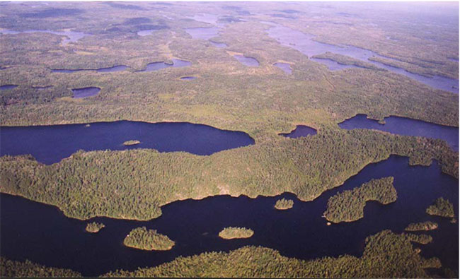 This photo shows Pipestone and Helena Lakes with Gates Ajar at lower right and the Northwest Arm and Schistose Lake in the distance.