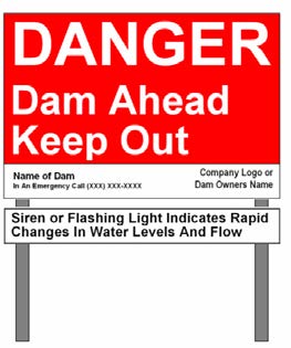 image of primary sign with siren sign mounted below.
