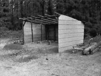 black and white photo of the fall hunt camp located to the south of the conservation reserve along connecting all terrain vehicle trails that provide access for hunters.
