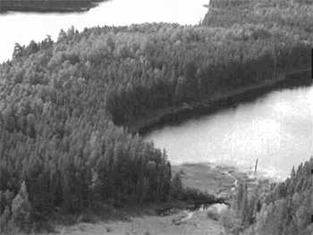 This is photo 1: Aerial view of small unnamed lake and wetland between Wagong and Dodge lakes.