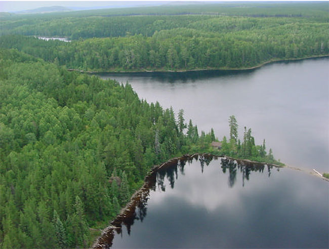 This photo shows Aerial view of trapper’s cabin on Spear Lake. Photo taken by William Foy, 2001.