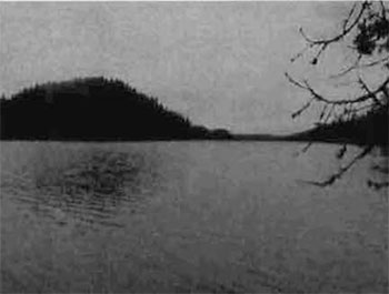 Black and white photo of Radisson Lake from the shore.
