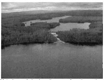 Black and white photo of the Matachewan Lake dam site across from the southern tip of C1602.
