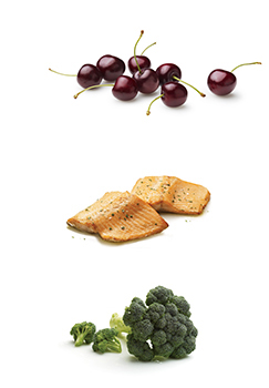 This is a photo of Cherries, rainbow trout and corn.