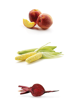 This is a photo of peaches, corn and beets.