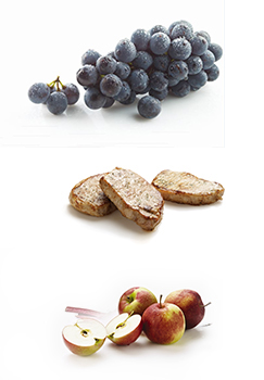 Bunches of grapes, steaks and apples.