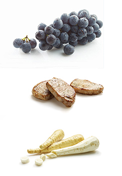 This is a photo of bunches of grapes, steaks and apples.
