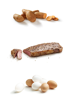 This is an image of sweet potatoes, steak and eggs