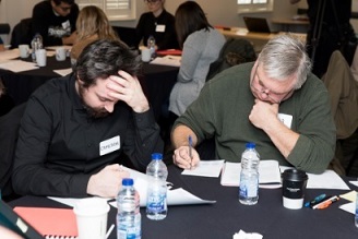 Panelists in Ottawa hard at work reading and evaluating ideas