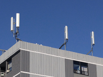 Long box-shaped structures mounted on support poles.