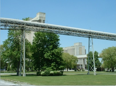 This picture shows a facility that has well vegetated grounds to minimize fugitive releases.