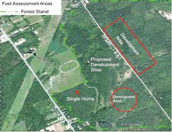 aerial photo of proposed development within a forested area