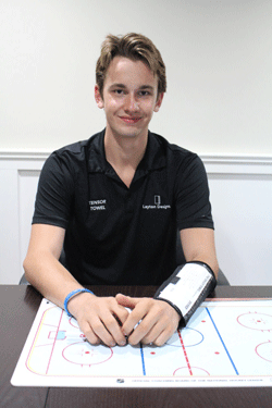 Photo of Wyatt Brauer, founder of Layton Designs, wearing his Tensor Towel armband.