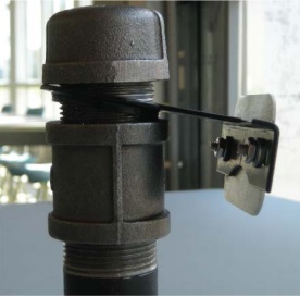 Figure 15-42 and Figure 15-43 are photographs of a well tag attached to a test hole - front view and side view.
