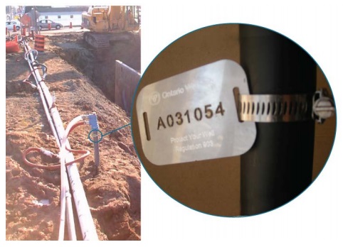 Figure 15-45 is a photograph of a well tag affixed to the casing of a point well in a well cluster.