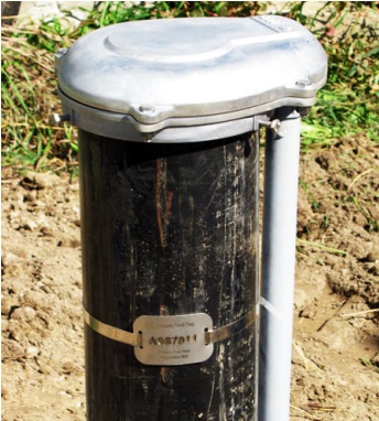 Figure 17-21 shows a picture of a well tag properly attached on a drilled well.