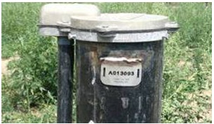 Figure 15-10 shows a picture of a well tag properly attached on a drilled well.
