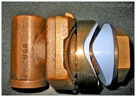 This is an image of a brass Corrugated Pitless adapter.