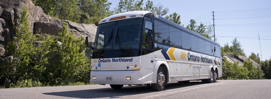 Ontario Northland Transportation Commission bus driving along a highway.