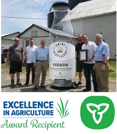Dairy Distillery. From left to right: Evan Porteous, Anthony Seed, Ernie Hardeman (Minister of Agriculture, Food and Rural Affairs), Neal McCarten, Omid McDonald, Jim McDonell, (MPP Stormont-Dundas-South Glengarry).