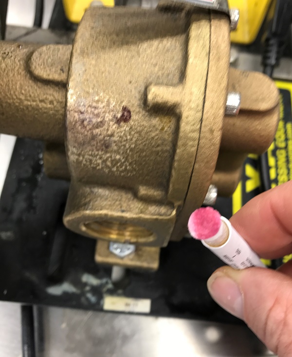 A brass pump that has tested positive for lead.
