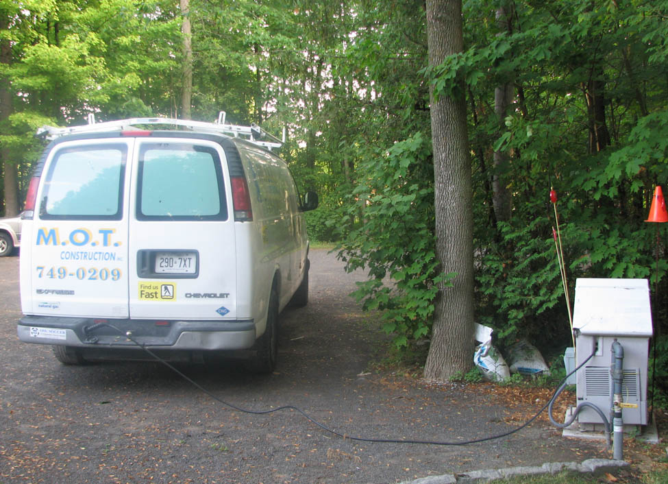  A commercial van being refuelled with natural ga