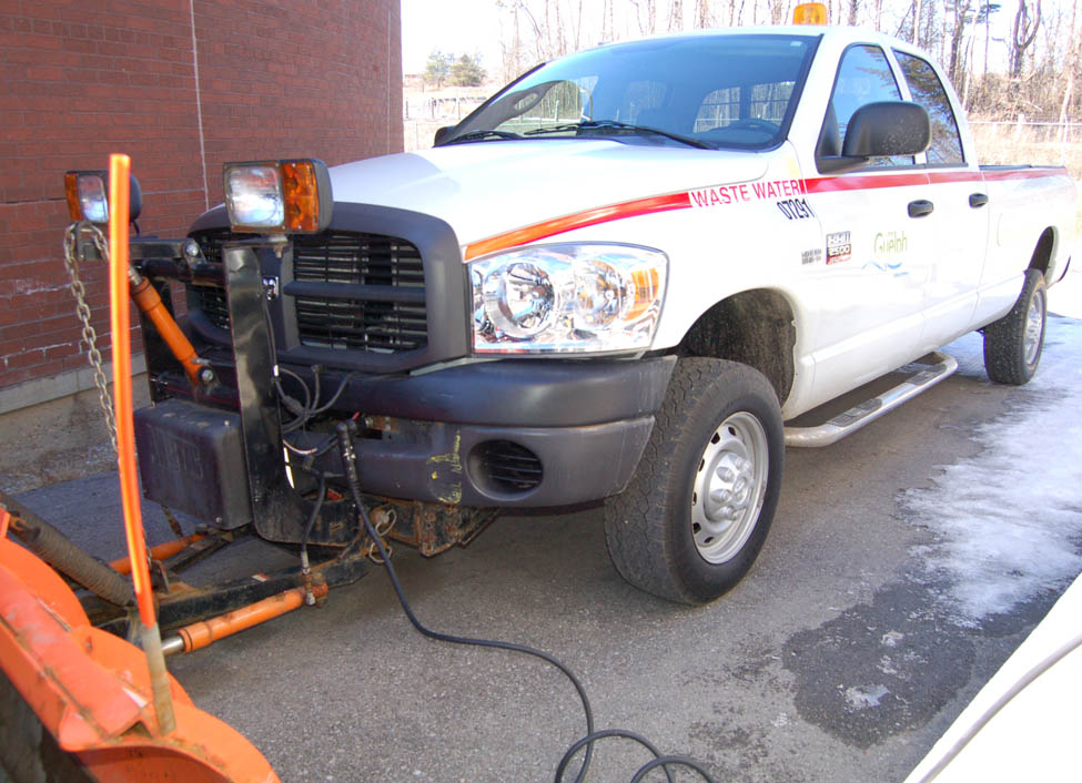 A vehicle refuelling appliance unit filling a City of Guelph pick-up with a blend of biogas and natural gas