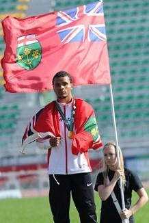 Team Ontario athletics athlete Andre De Grasse on the podium at 2013 Canada Summer Games