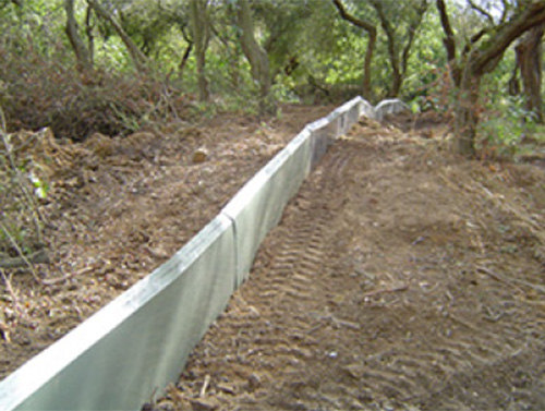 Figure 7: Image showing a constructed fence made from vinyl sheeting.